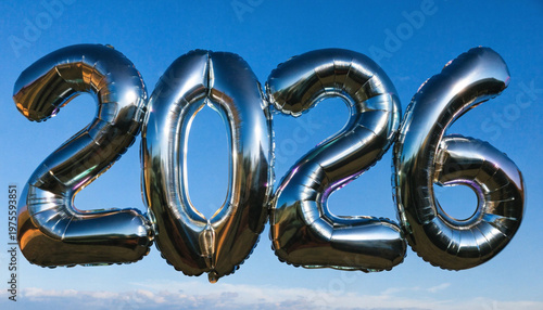 3D metallic 2026 number balloons on black background for new year celebration