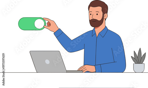 Man drinking from a bottle while working on laptop at office desk