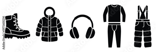 Collection of essential warm winter clothing and outdoor gear including boots jacket earmuffs thermal underwear and snow pants for cold weather activities and seasonal wear