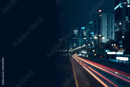 Blurred city lights and traffic trails at night