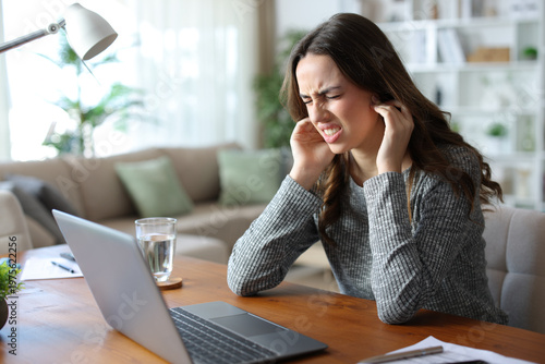 Photography Tele worker suffering jaw pain working at home