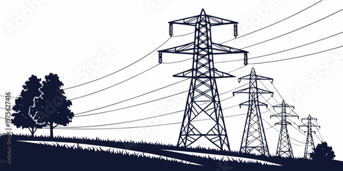 Man in a hard hat looking up at a tall power transmission tower