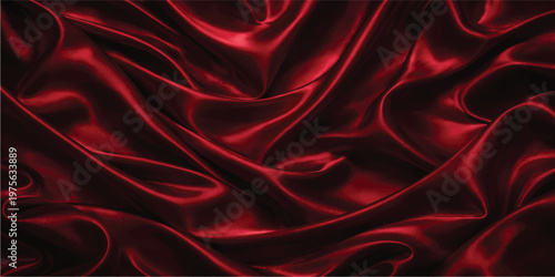 A luxurious red silk and satin fabric background features smooth flowing waves of shiny textile material with soft curves and elegant drapery for a decorative fashion backdrop