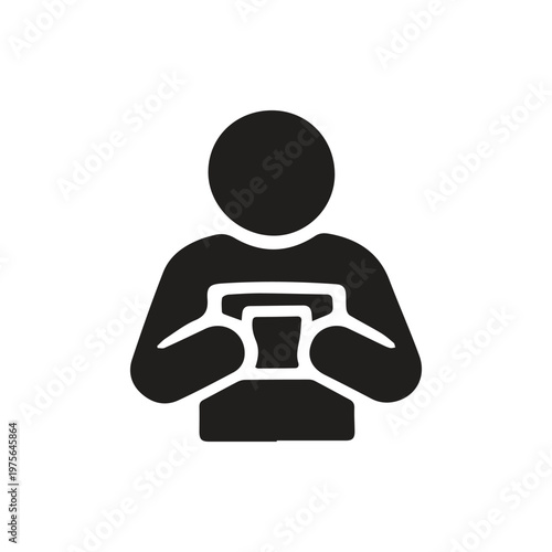 Modern user absorbed in their portable electronic gadget browsing or texting