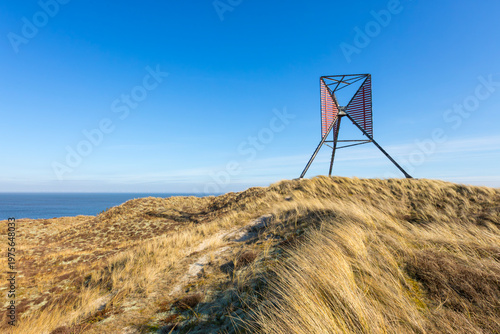Old wooden beacon facing Rinkgøbing Fjord at Hvide Sande, Holmsklit spit