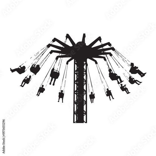 Silhouette of amusement park swing carousel ride with people spinning in motion