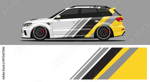 Sleek race car with bold geometric livery and yellow accents on a gray backdrop.