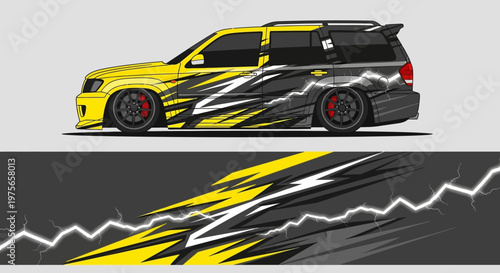 Bold yellow and black racing car with dynamic graphics on white background.