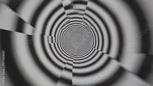 Abstract black and white spiral tunnel of concentric rings creating a hypnotic motion background, ideal for science fiction, time travel, illusion, and futuristic design concepts for advertising