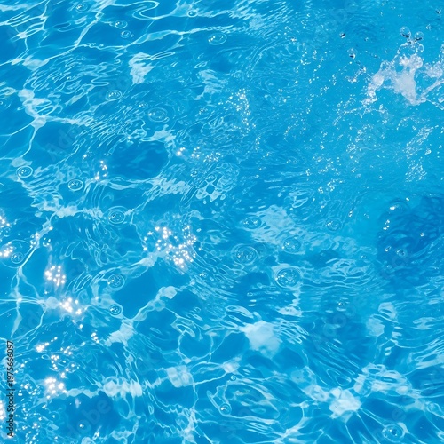 Clear Blue Water Surface with Ripples and Reflections.