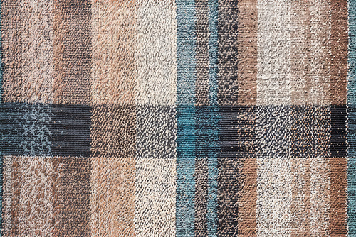 Seamless embroidery pattern of textured checkered fabric pattern with brown blue and beige colors. for home decor