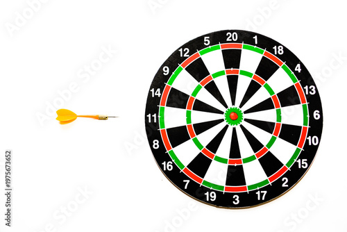 Dartboard with target and arrow isolated on a white background. Dartboard and dart arrow on white background. Business and success concept. Target and dart board. Dart arrow
