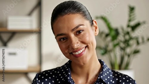 Confident Woman Smiling in Home Office Setting Video.