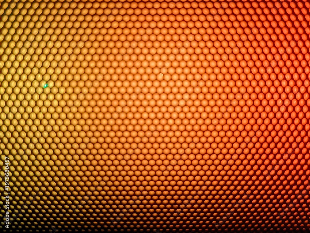 Obraz premium Golden orange honeycomb pattern texture background with premium metallic finish