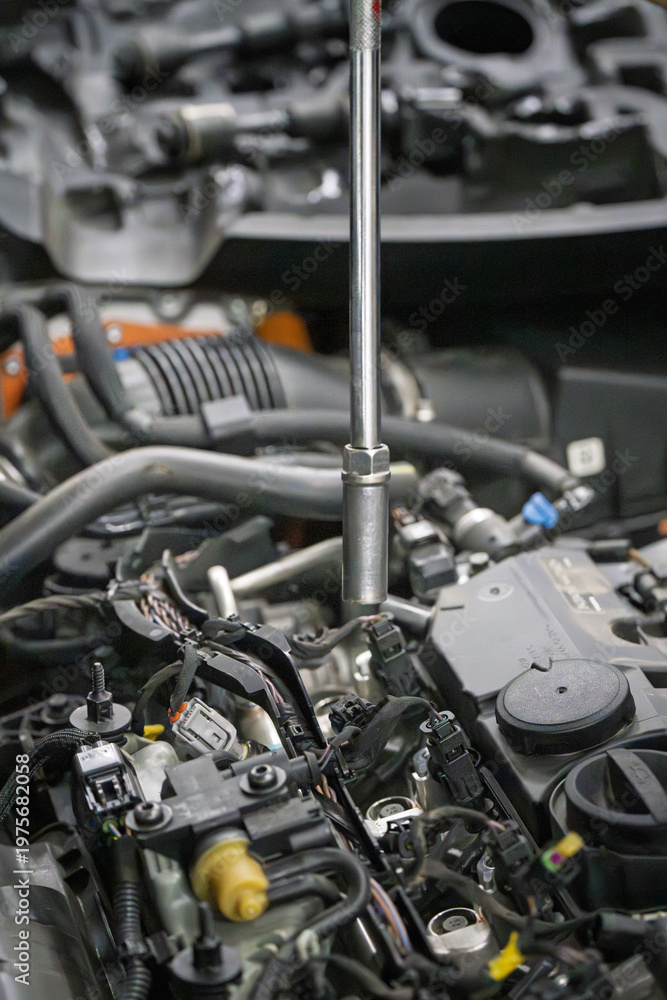 Fototapeta premium Close Up of Wrench Repair in Car Engine Bay