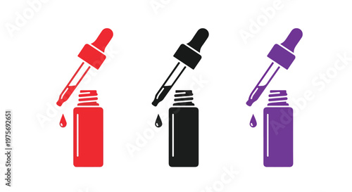 Close-up of colorful dropper bottles with pipettes filled with liquid in vibrant red black and purple colors