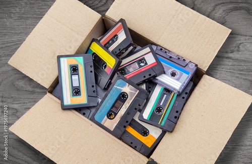 old audio cassettes in carton box