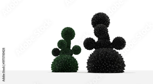 Two abstract organic sculptures with textured surfaces, one dark green and one black, against a plain white background.