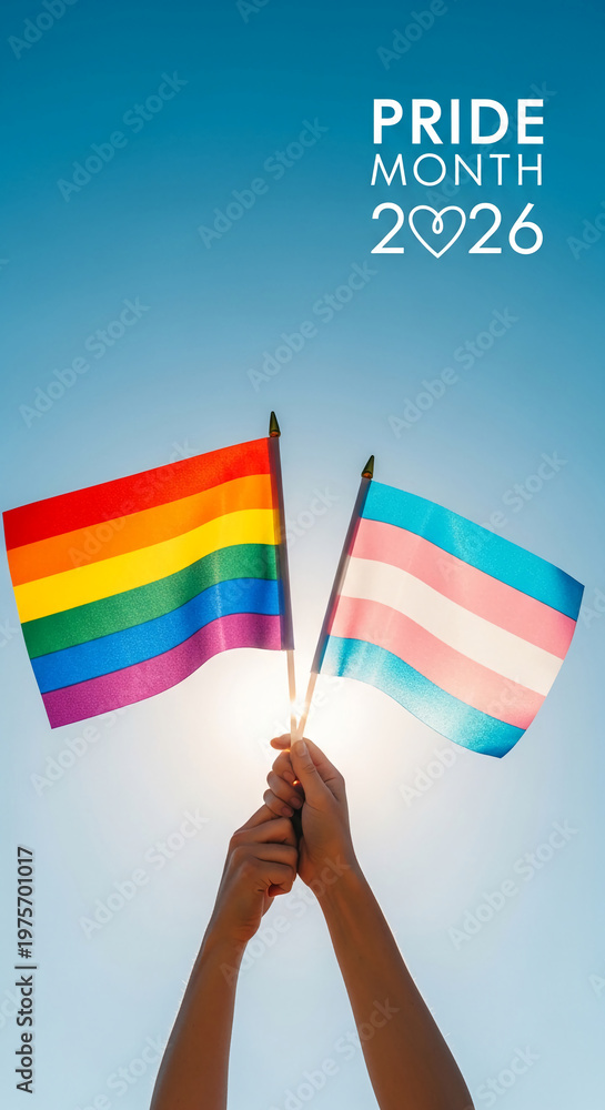 Fototapeta premium Two hands holding rainbow and transgender flags against a bright blue sky, celebrating Pride Month 2026, symbolizing equality and support