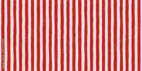 Seamless patterns with pink and red hand drawn vertical stripes. Geometric background.
