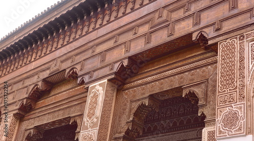Carved and painted stucco and cedar wood on the south side of the small courtyard of the luxurious, Moorish style Bahia Palace. Marrakesh-Morocco-262