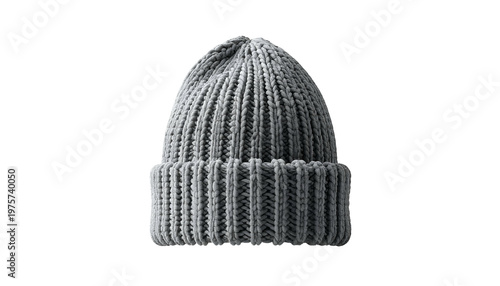A close-up studio shot of a grey ribbed-knit beanie hat against a pure black background