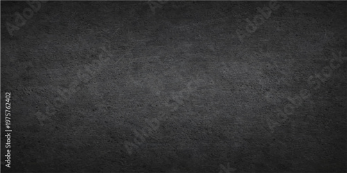 Textured charcoal surface, offering a versatile backdrop for design elements. Evoking a sense of depth and tactile allure.