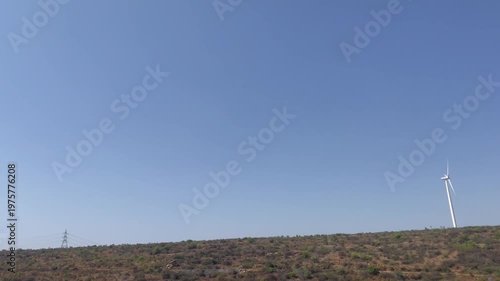 Wind Turbines on Hill Landscape  Clean Renewable Energy in Rural Terrain