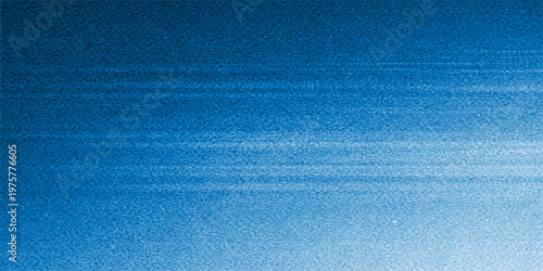 Abstract textured shades of blue, the image showcases a gradient of colors and a subtle texture. The cool palette evokes a sense of tranquility. 