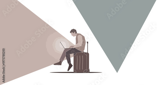 Man sitting with suitcase and laptop