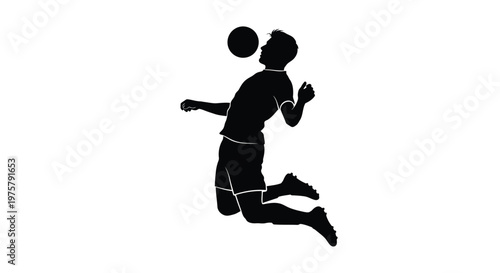 Silhouette of a man heading a soccer ball in mid air