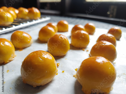 Selective focus of Kue nastar or pineapple tart. indonesian eid snack (kue lebaran). bright mood style. perfect for recipe, article, catalogue, or any commercial purposes.