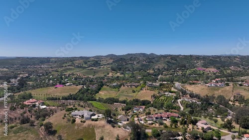 Aerial view of Fallbrook, Rainbow Crest, Rainbow Ridge with big mansion and green valley, San Diego County California