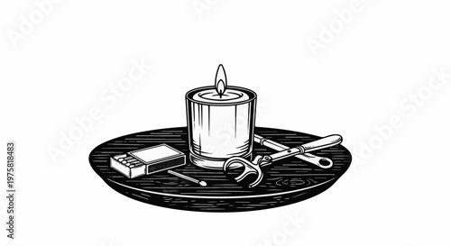 Lit candle, matchbox, and wick trimmer on a textured wooden surface