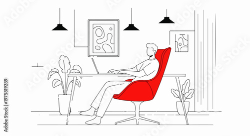 Person working on laptop at a desk in a modern, minimalist room