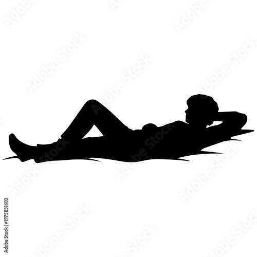 Silhouette of a man relaxing on his back, arms behind head, looking up