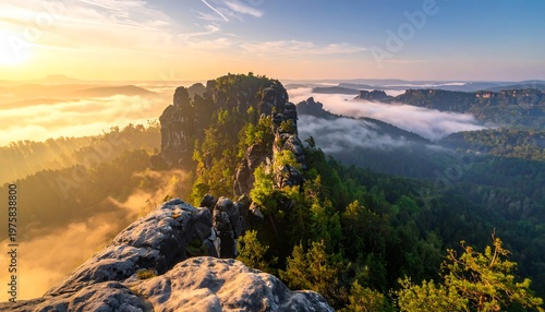 A serene mountain landscape at sunrise with foggy valleys