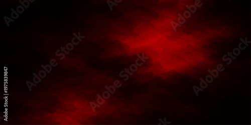 Dramatic abstract fire and red smoke swirling against a dark stormy sky with sunset clouds and glowing orange sunlight