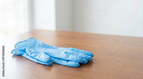 Medical gloves placed on a table. Concept of health protection and medical safety. Clinical equipment and hygiene.