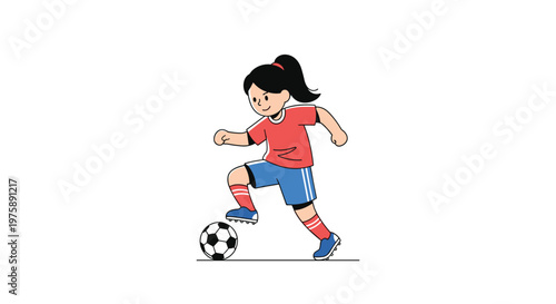 Young girl in a red jersey and blue shorts skillfully dribbling a soccer ball during a sports match or training session.