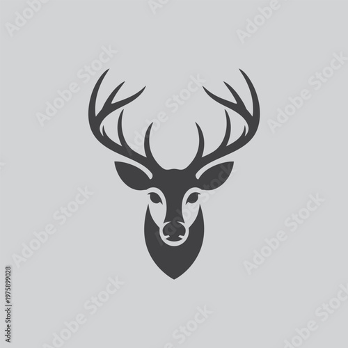 Stylized illustration of a deer head with large antlers against a plain