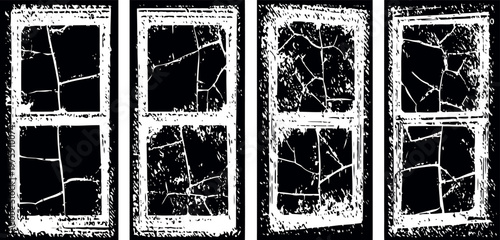 Four cracked glass window panes with white frames on a black background