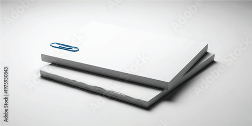 Stack of blank white paper sheets with a single blue metal paperclip resting on the surface against a plain light gray background