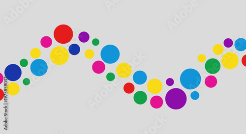 A colorful vector graphic of a wavy line made up of various sized circles in different colors