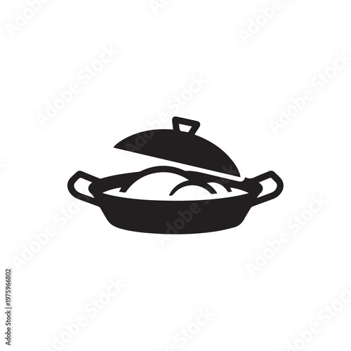 Food cooking in a pot with lid open during preparation with minimalist style