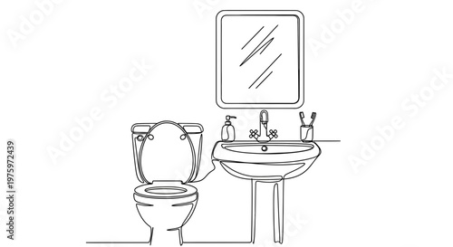 Toilet and pedestal sink bathroom fixtures.