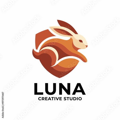 The modern rabbit logo features a sleek design within a shield, symbolizing creativity and agility, ideal for a creative studio looking for a unique branding element.