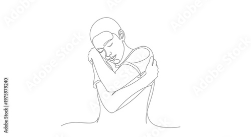Man sitting with head on knees.