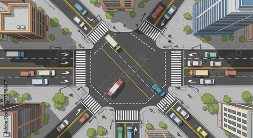 Aerial View of a Busy City Intersection with Cars and Pedestrians.