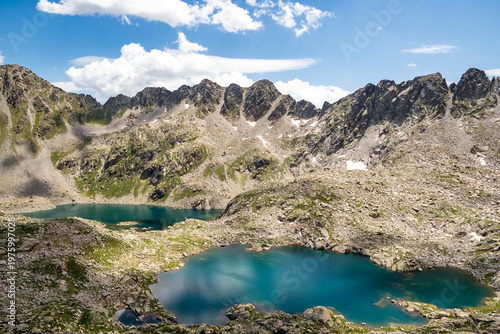 Lac Deth Cap de Colomers and Estanh de Ratera, at 2.528m, are two beautiful glacial lakes in the Circ de Colomers hiking trail, province of Lleida, Catalonia, Spain

